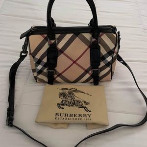 Cute Burberry check bag .